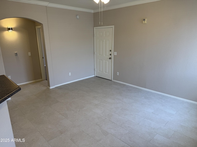 1941 S Pierpont Dr Unit 1043, Mesa, AZ 85206 - empty room featuring arched walkways, crown molding, and light tile patterned floors