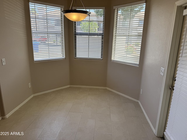 1941 S Pierpont Dr Unit 1043, Mesa, AZ 85206 - unfurnished dining area with baseboards