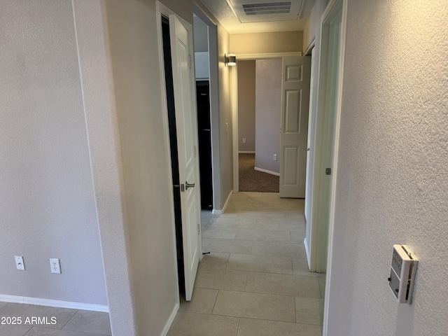1941 S Pierpont Dr Unit 1043, Mesa, AZ 85206 - corridor featuring light tile patterned floors and a textured wall