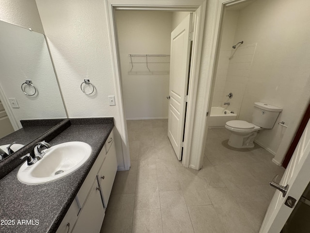 1941 S Pierpont Dr Unit 1043, Mesa, AZ 85206 - full bath featuring vanity, shower / washtub combination, tile patterned floors, and a spacious closet