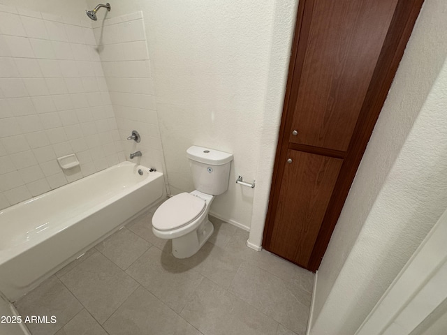 1941 S Pierpont Dr Unit 1043, Mesa, AZ 85206 - bathroom featuring shower / washtub combination, a textured wall, and tile patterned floors