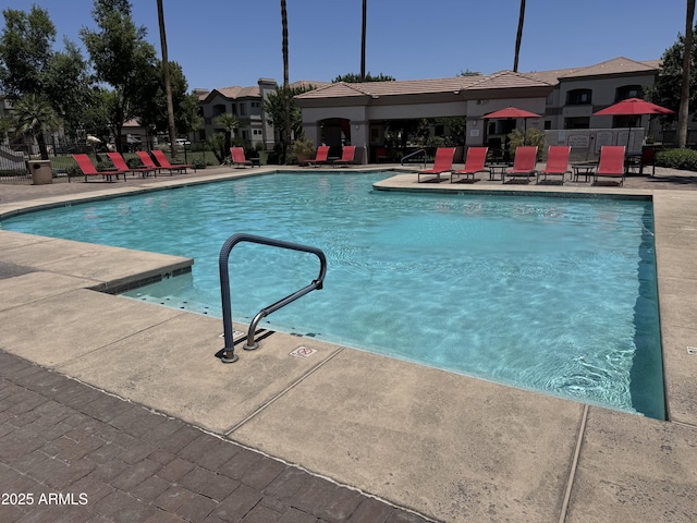 1941 S Pierpont Dr Unit 1043, Mesa, AZ 85206 - community pool featuring a patio