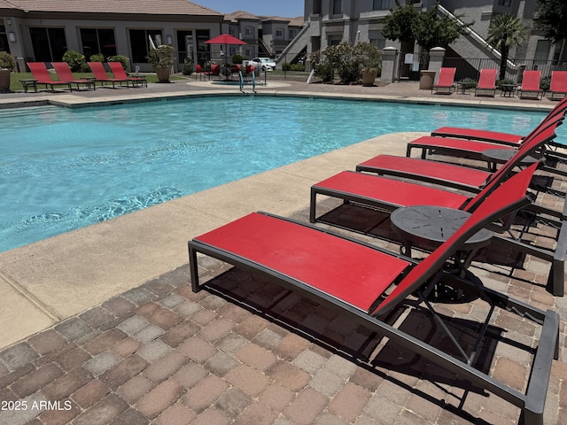 1941 S Pierpont Dr Unit 1043, Mesa, AZ 85206 - community pool featuring a patio area