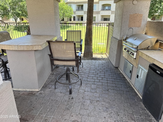 1941 S Pierpont Dr Unit 1043, Mesa, AZ 85206 - view of patio / terrace featuring exterior kitchen