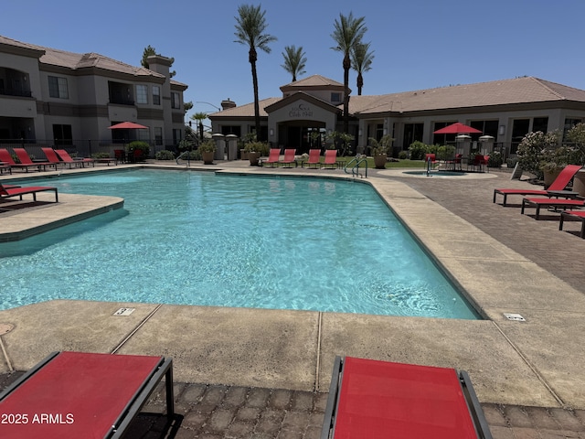1941 S Pierpont Dr Unit 1043, Mesa, AZ 85206 - community pool featuring a patio area