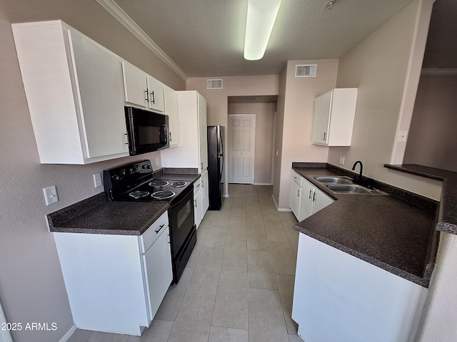 1941 S Pierpont Dr Unit 1043, Mesa, AZ 85206 - kitchen featuring black appliances, dark countertops, white cabinetry, light tile patterned flooring, and a textured ceiling
