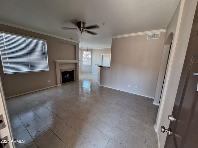 1941 S Pierpont Dr Unit 1043, Mesa, AZ 85206 - unfurnished living room featuring a ceiling fan, crown molding, and a fireplace
