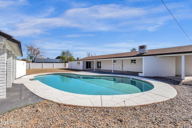 view of pool with central AC