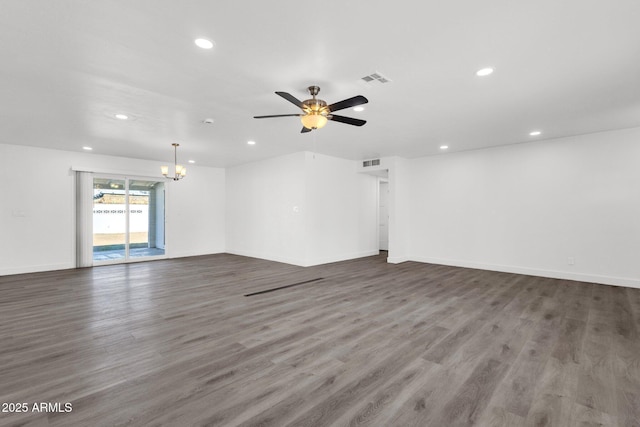 unfurnished room with wood-type flooring and ceiling fan with notable chandelier