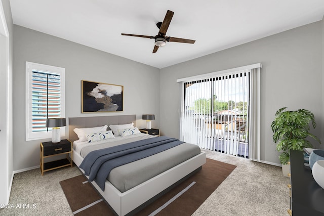 carpeted bedroom with access to exterior and ceiling fan