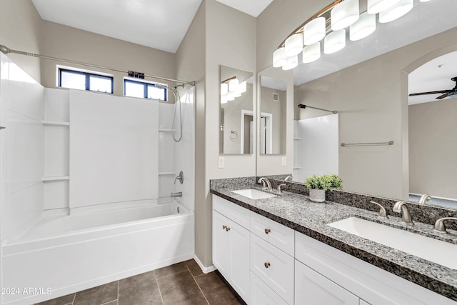 bathroom with tile patterned flooring, ceiling fan, vanity, and shower / bathtub combination