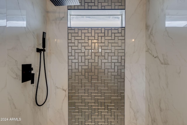 details with a tile shower