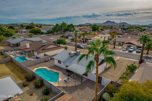 birds eye view of property featuring a mountain view