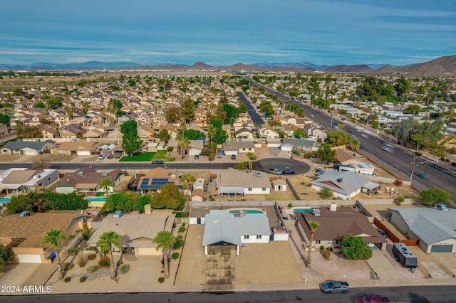 drone / aerial view featuring a mountain view