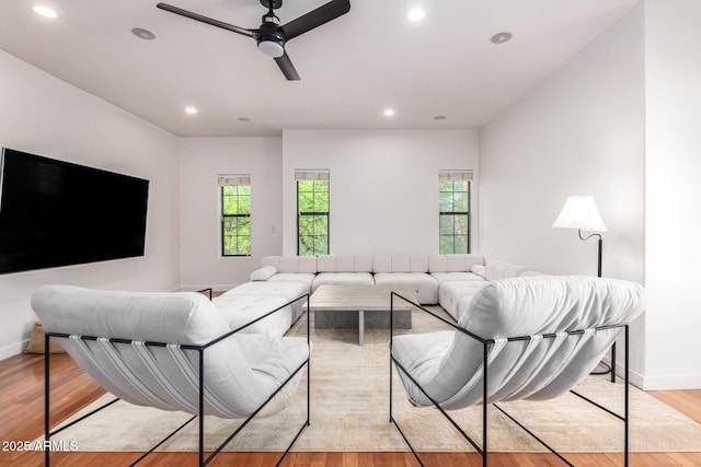 3150 E Beardsley Rd Unit 1081, Phoenix, AZ 85050 - living area featuring a ceiling fan, light wood finished floors, and recessed lighting