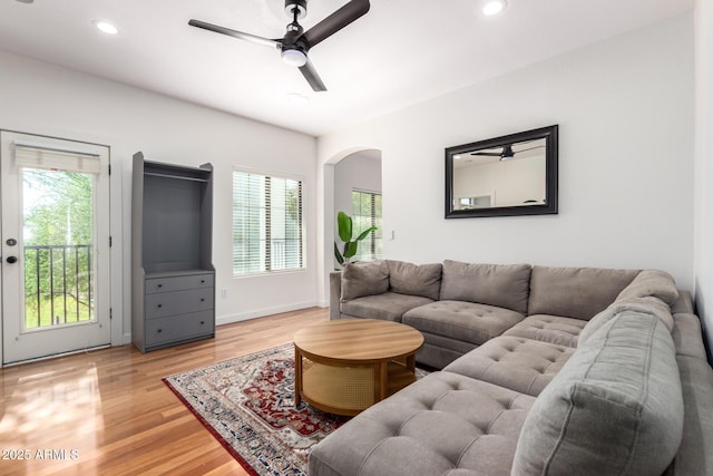 3150 E Beardsley Rd Unit 1081, Phoenix, AZ 85050 - living area featuring ceiling fan, arched walkways, light wood-style flooring, and recessed lighting