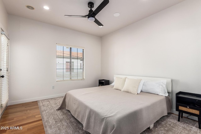 3150 E Beardsley Rd Unit 1081, Phoenix, AZ 85050 - bedroom with recessed lighting, light wood-style floors, and a ceiling fan