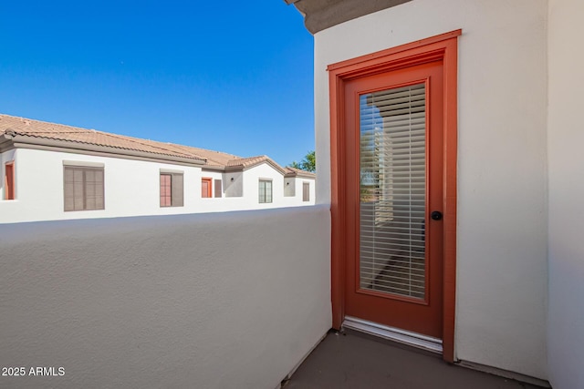 3150 E Beardsley Rd Unit 1081, Phoenix, AZ 85050 - doorway to property with a balcony and stucco siding