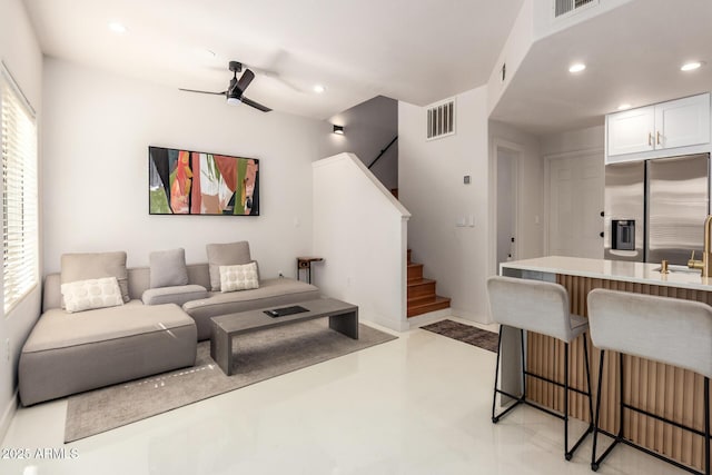 3150 E Beardsley Rd Unit 1081, Phoenix, AZ 85050 - living area with stairs, a ceiling fan, recessed lighting, and finished concrete floors