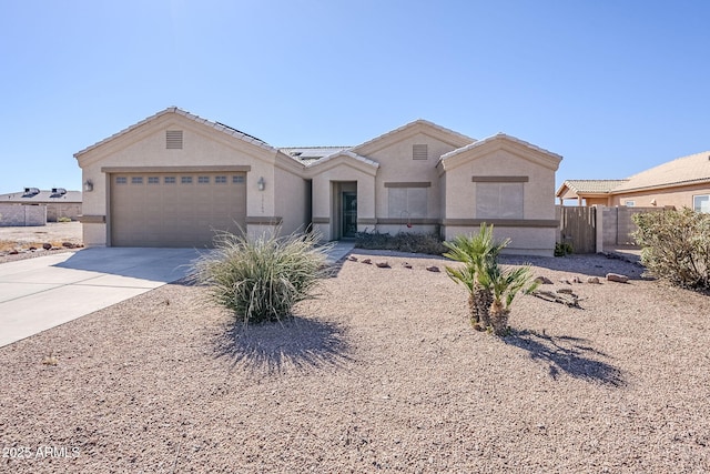 ranch-style home with a garage