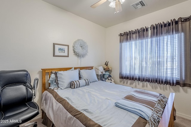 carpeted bedroom featuring ceiling fan