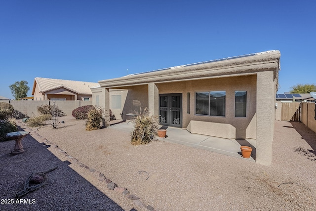 view of front of property featuring a patio area