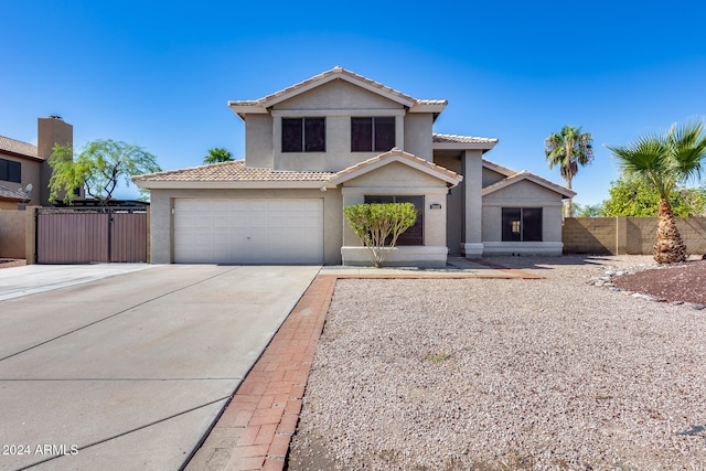 view of front of property with a garage