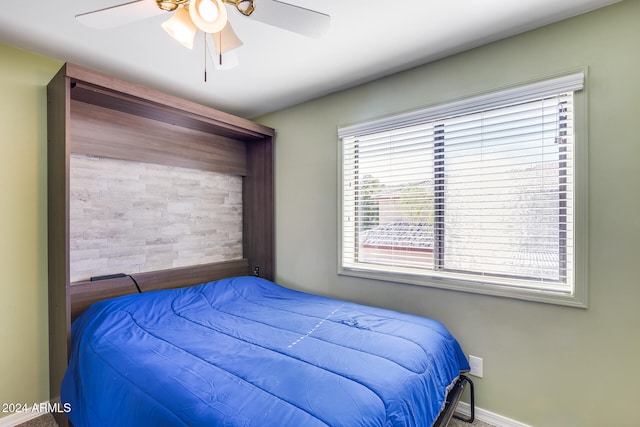 bedroom featuring ceiling fan