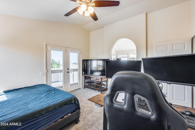 carpeted bedroom featuring french doors, access to exterior, ceiling fan, and vaulted ceiling