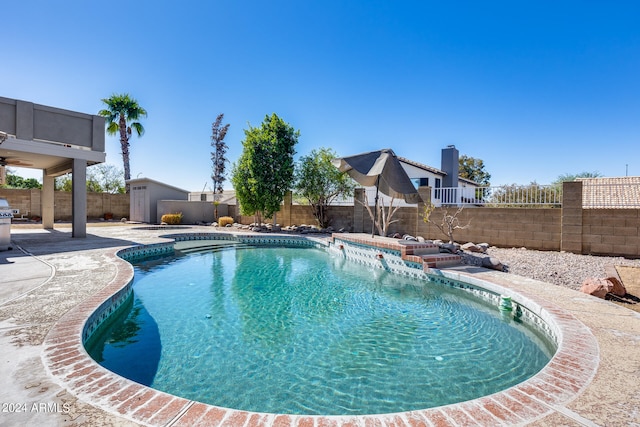 view of pool featuring a patio