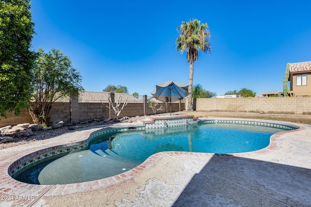 view of swimming pool featuring a patio