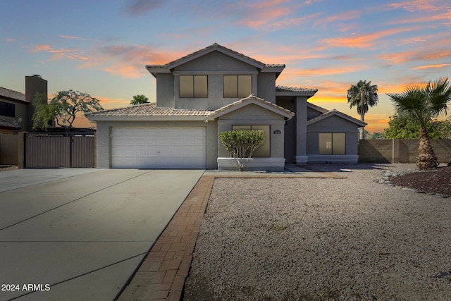 front facade with a garage