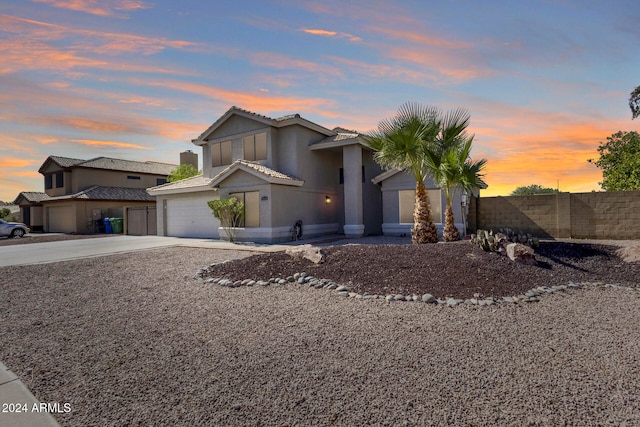 view of front of property with a garage