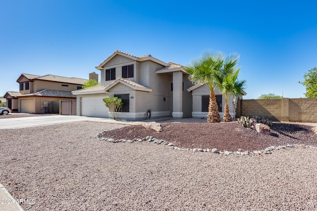 view of front of home featuring a garage