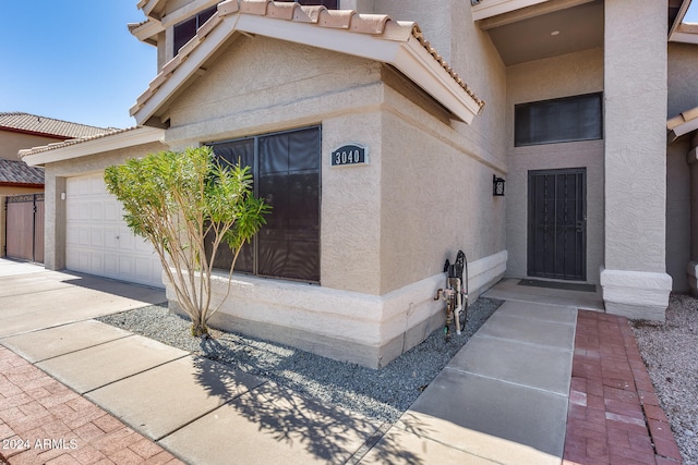 entrance to property with a garage