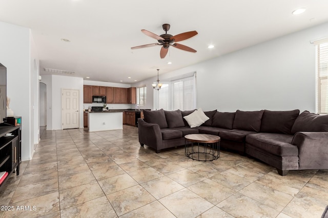 29751 N 119th Ln, Peoria, AZ 85383 - living area with a ceiling fan, arched walkways, and recessed lighting