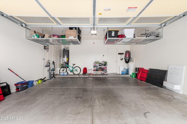 29751 N 119th Ln, Peoria, AZ 85383 - garage featuring water heater and a garage door opener