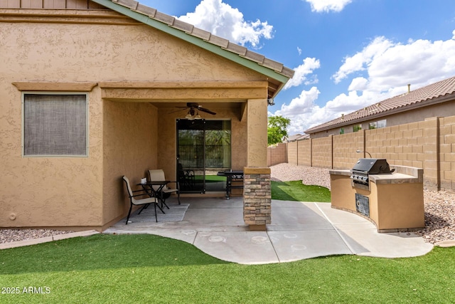 29751 N 119th Ln, Peoria, AZ 85383 - fenced backyard featuring a patio and ceiling fan