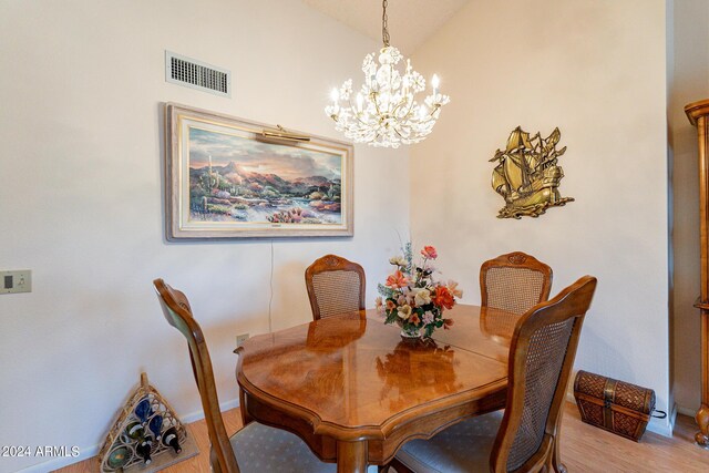 dining area featuring a chandelier and plenty of natural light