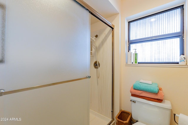 full bathroom with vanity, bath / shower combo with glass door, toilet, and tile patterned flooring