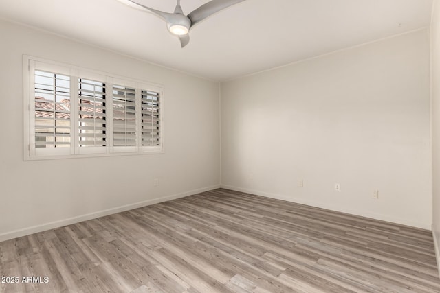8540 N Central Ave Unit 6, Phoenix, AZ 85020 - spare room featuring wood finished floors and a ceiling fan