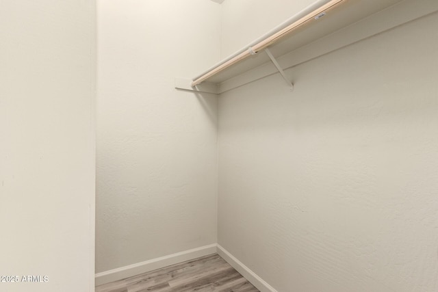 8540 N Central Ave Unit 6, Phoenix, AZ 85020 - walk in closet featuring light wood-style floors
