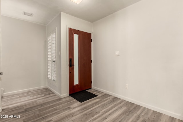 8540 N Central Ave Unit 6, Phoenix, AZ 85020 - entrance foyer with wood finished floors and baseboards