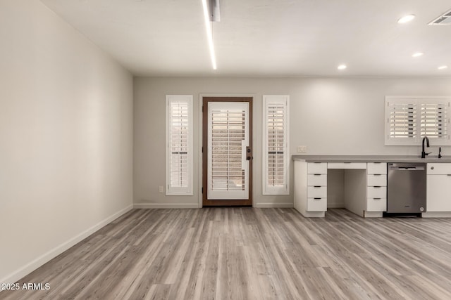 8540 N Central Ave Unit 6, Phoenix, AZ 85020 - interior space featuring dishwasher, light wood-style floors, white cabinetry, and recessed lighting