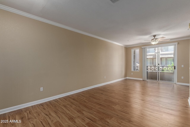 4465 E Paradise Village Pkwy S Unit 1224, Phoenix, AZ 85032 - empty room featuring ornamental molding, wood finished floors, baseboards, and ceiling fan