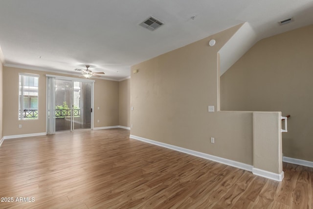 4465 E Paradise Village Pkwy S Unit 1224, Phoenix, AZ 85032 - unfurnished living room with light wood-type flooring, ceiling fan, baseboards, and ornamental molding