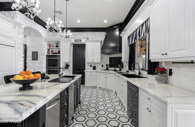 kitchen featuring white cabinets, ornamental molding, appliances with stainless steel finishes, and custom exhaust hood
