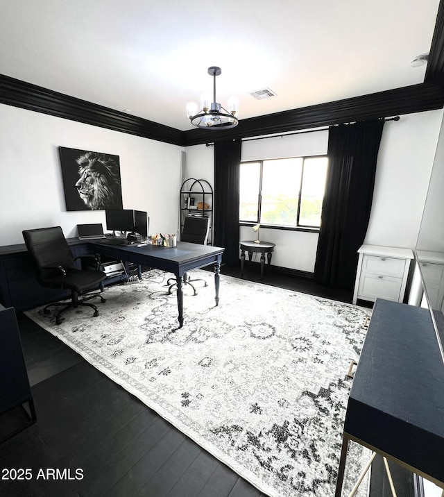 office area featuring visible vents, a notable chandelier, wood finished floors, and ornamental molding