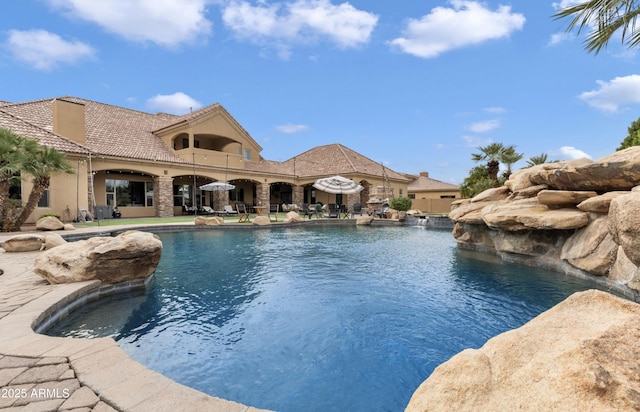 pool with a patio area