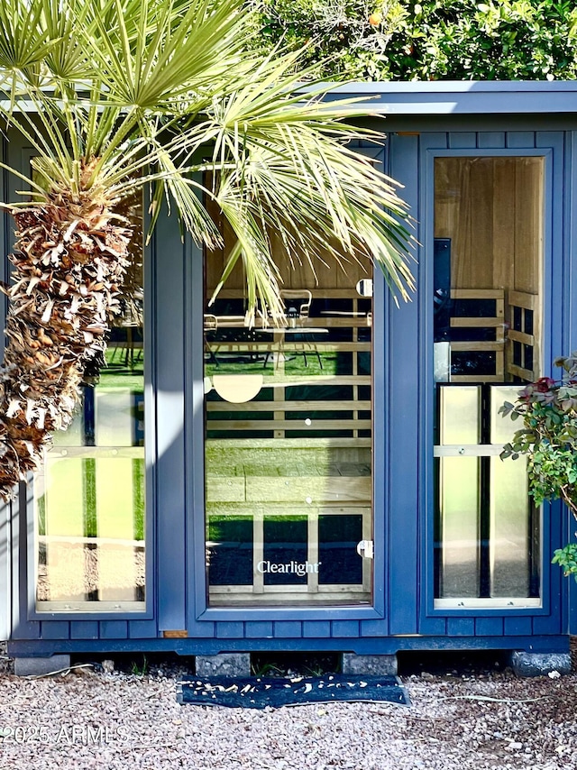 view of home's exterior featuring an outbuilding